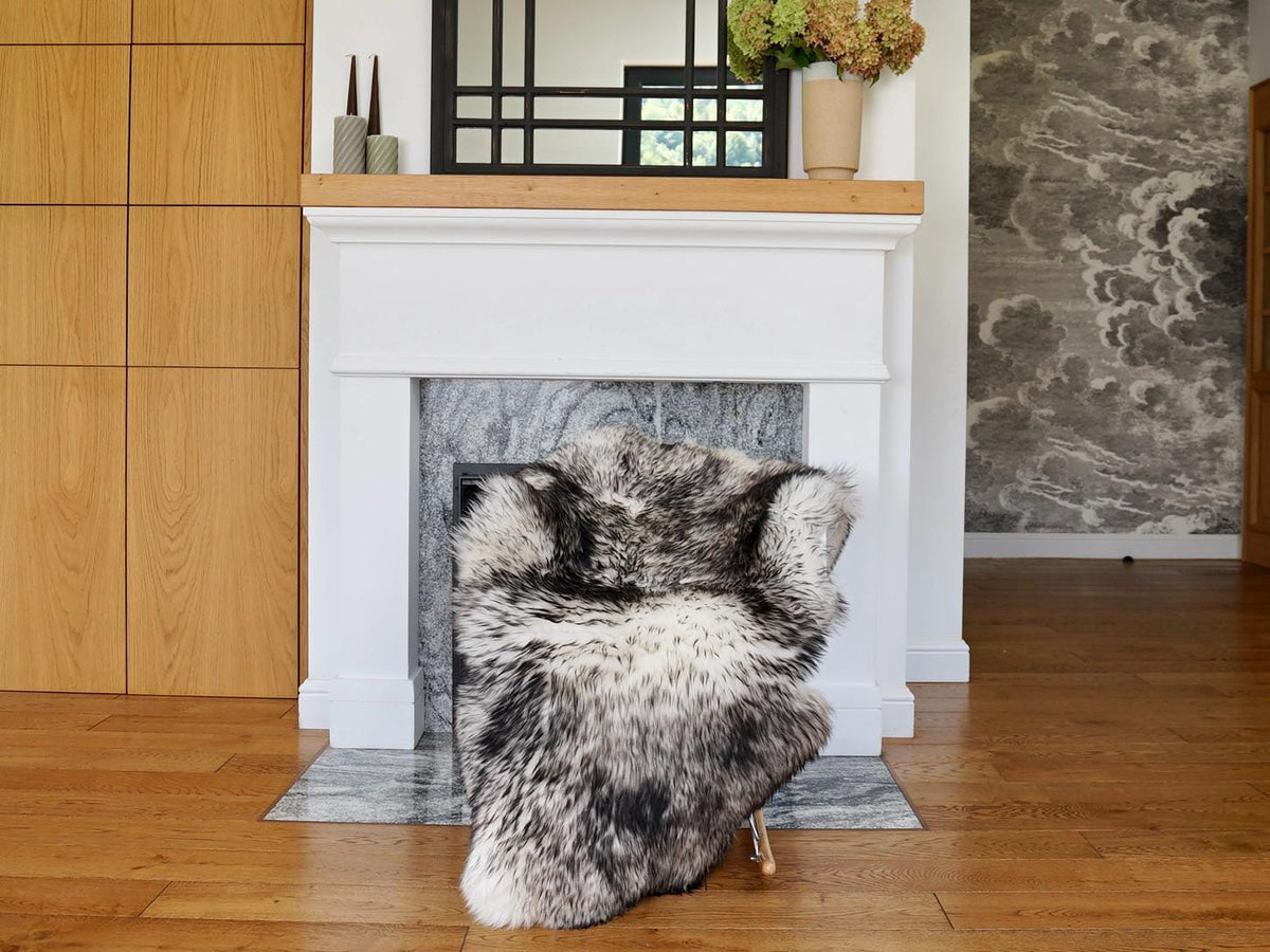 Natural Sheepskin Rug with Black-Dyed Wool Tips, Soft Fluffy Genuine Wool Pelt, 50 x 30 Inch Luxury Accent for Bedroom, Chair, Bench, or Cozy Corner