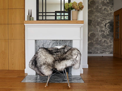 Natural Sheepskin Rug with Black-Dyed Wool Tips, Soft Fluffy Genuine Wool Pelt, 50 x 30 Inch Luxury Accent for Bedroom, Chair, Bench, or Cozy Corner