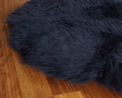 SHEEPSKIN Black  Throw Genuine leather  color Sheep Skin Decorative rug 46"x 26" comfy, cozy, hair is very thick, shiny