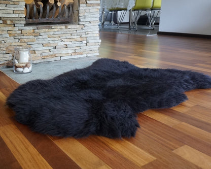 SHEEPSKIN Black  Throw Genuine leather  color Sheep Skin Decorative rug 46"x 26" comfy, cozy, hair is very thick, shiny