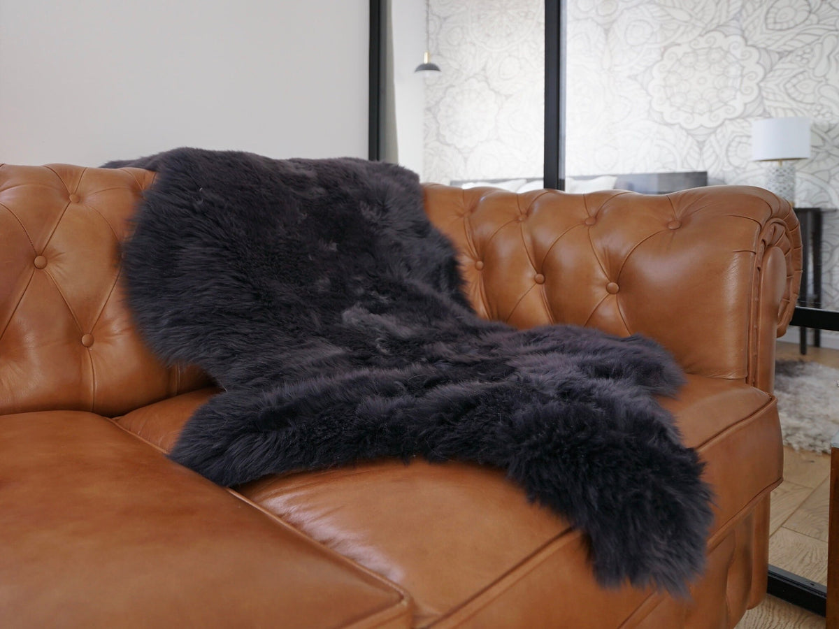 SHEEPSKIN Black  Throw Genuine leather  color Sheep Skin Decorative rug 48"x 28" comfy, cozy, hair is very thick, shiny