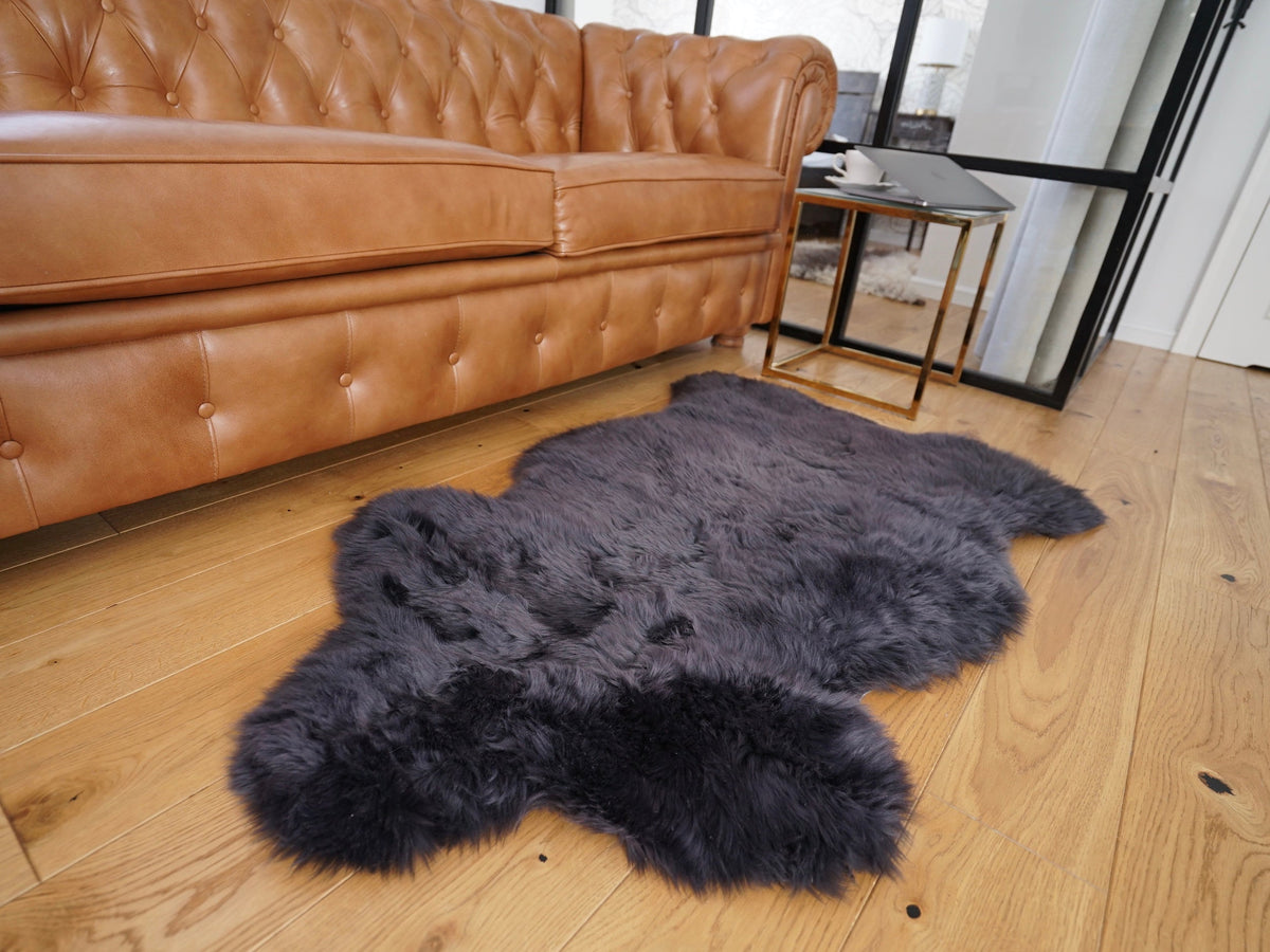 SHEEPSKIN Black  Throw Genuine leather  color Sheep Skin Decorative rug 48"x 28" comfy, cozy, hair is very thick, shiny